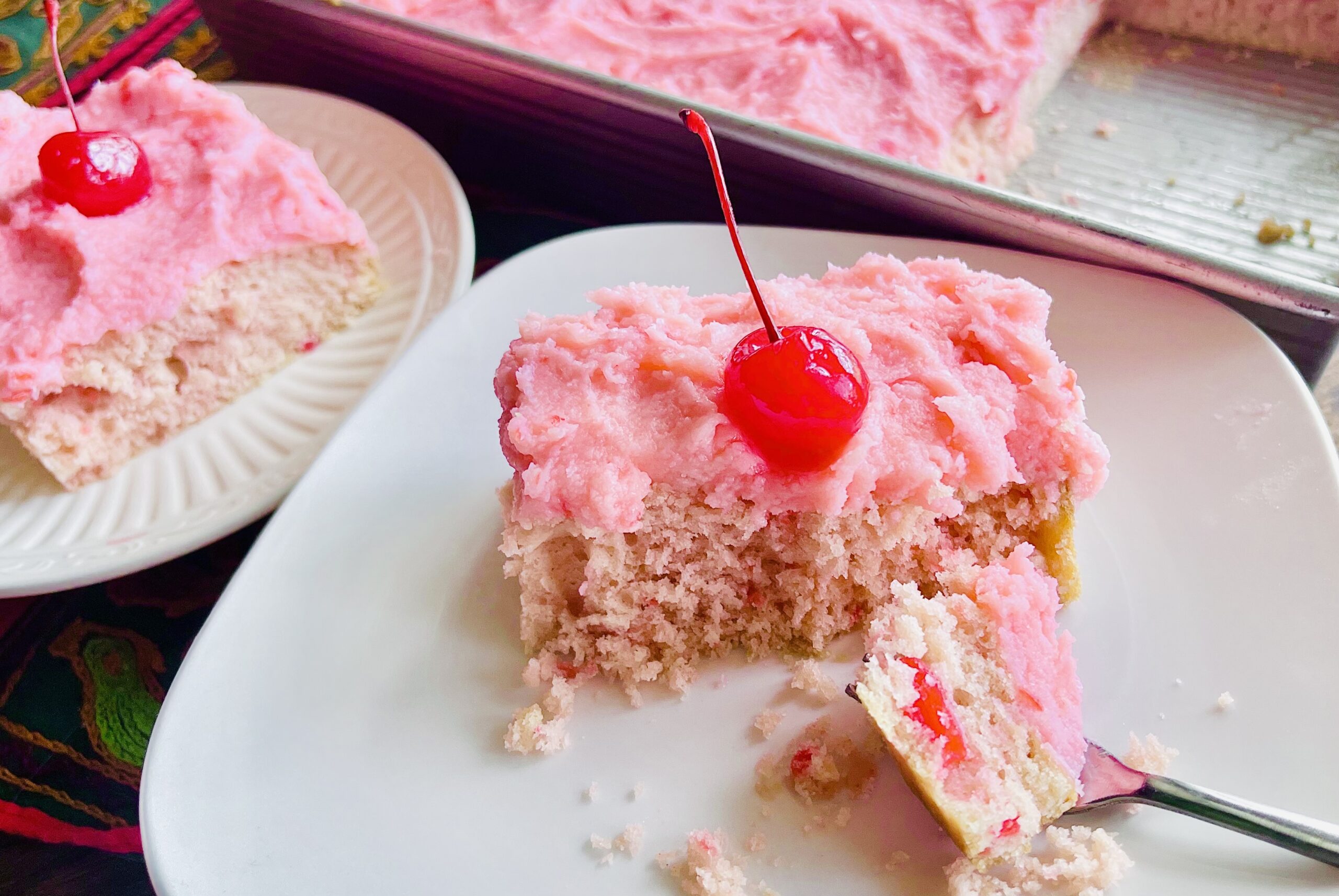 Cherry Buttercream Frosting spread over Cherry Icebox Cake